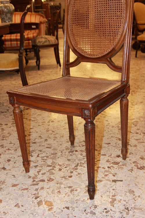 Gruppo di 8 sedie Luigi XVI del 1800 in legno di mogano incannate