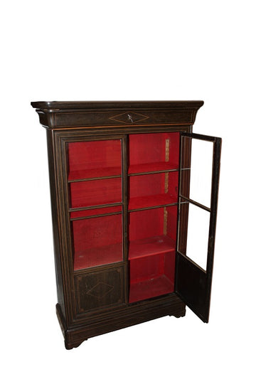 Vitrine bibliothèque française des années 1800, de style Charles X, en bois d'ébène avec incrustations