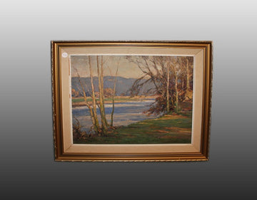 Huile sur toile du XXème siècle représentant Paysage fluvial avec forêt