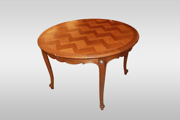 Extendable circular Provençal table from the early 1900s in oak wood with parquet top