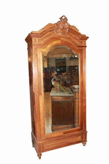 Antique French wardrobe from 1800 Louis Philippe style in walnut wood