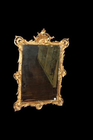 Miroir français élaboré du début des années 1800 en feuille d'or dorée