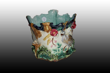 Porta vaso in ceramica riccamente decorata con anatre