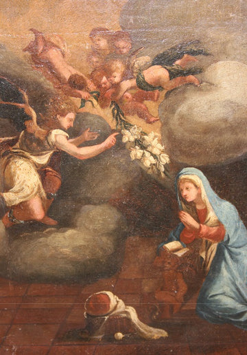 Italian oil on canvas from the early 1700s depicting the Annunciation of the Virgin Mary