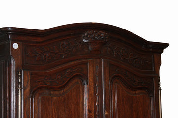 Armoire français à 2 portes de style provençal du début du 19ème siècle en bois de chêne
