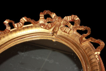 Specchiera ovale Francese in legno dorato foglia oro del 1800