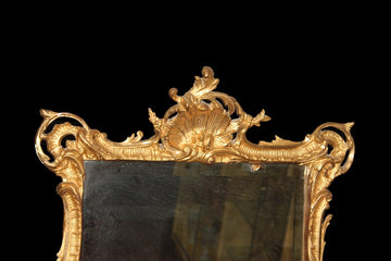 Miroir français élaboré du début des années 1800 en feuille d'or dorée