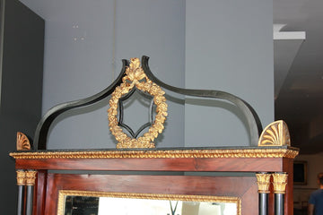 Grand miroir battant Psyché de la première moitié du XIXème siècle, de style Empire en acajou