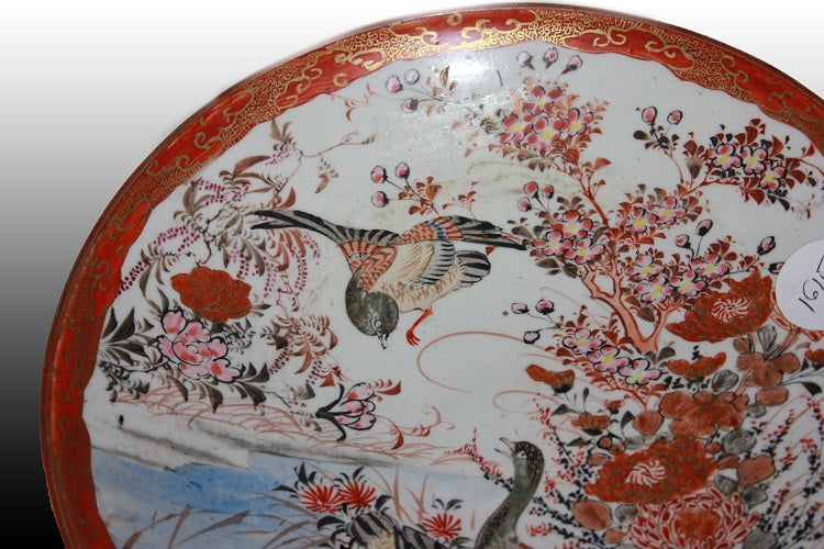 Coppia di piatti Cinesi in porcellana decorata con scena lacustre