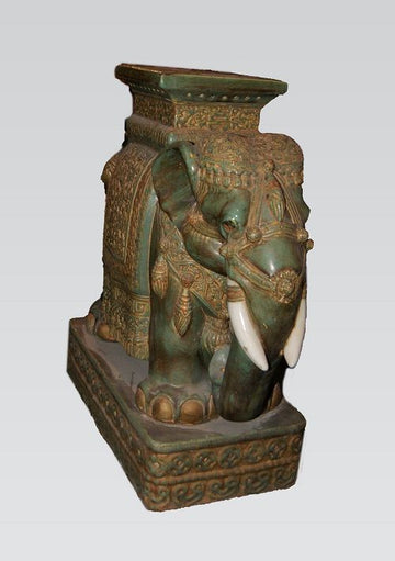 Paire d'éléphants orientaux antique en céramique émaillée