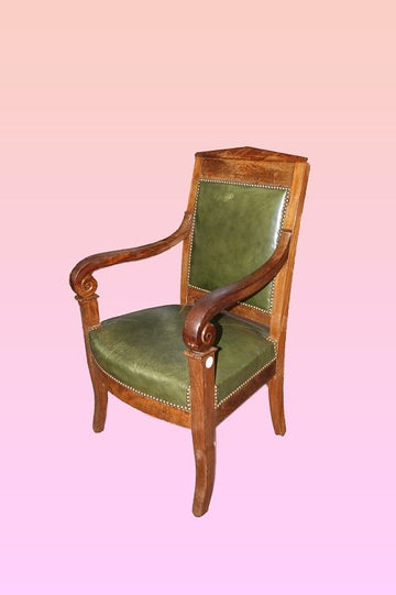 Antique French leather mahogany Empire armchair from the 1800s