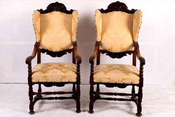 Antique French armchairs from the 19th century in carved and upholstered oak