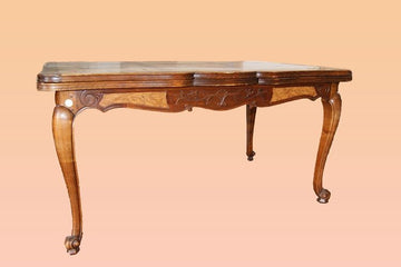 Antique extendable table from the 19th century in French cherry