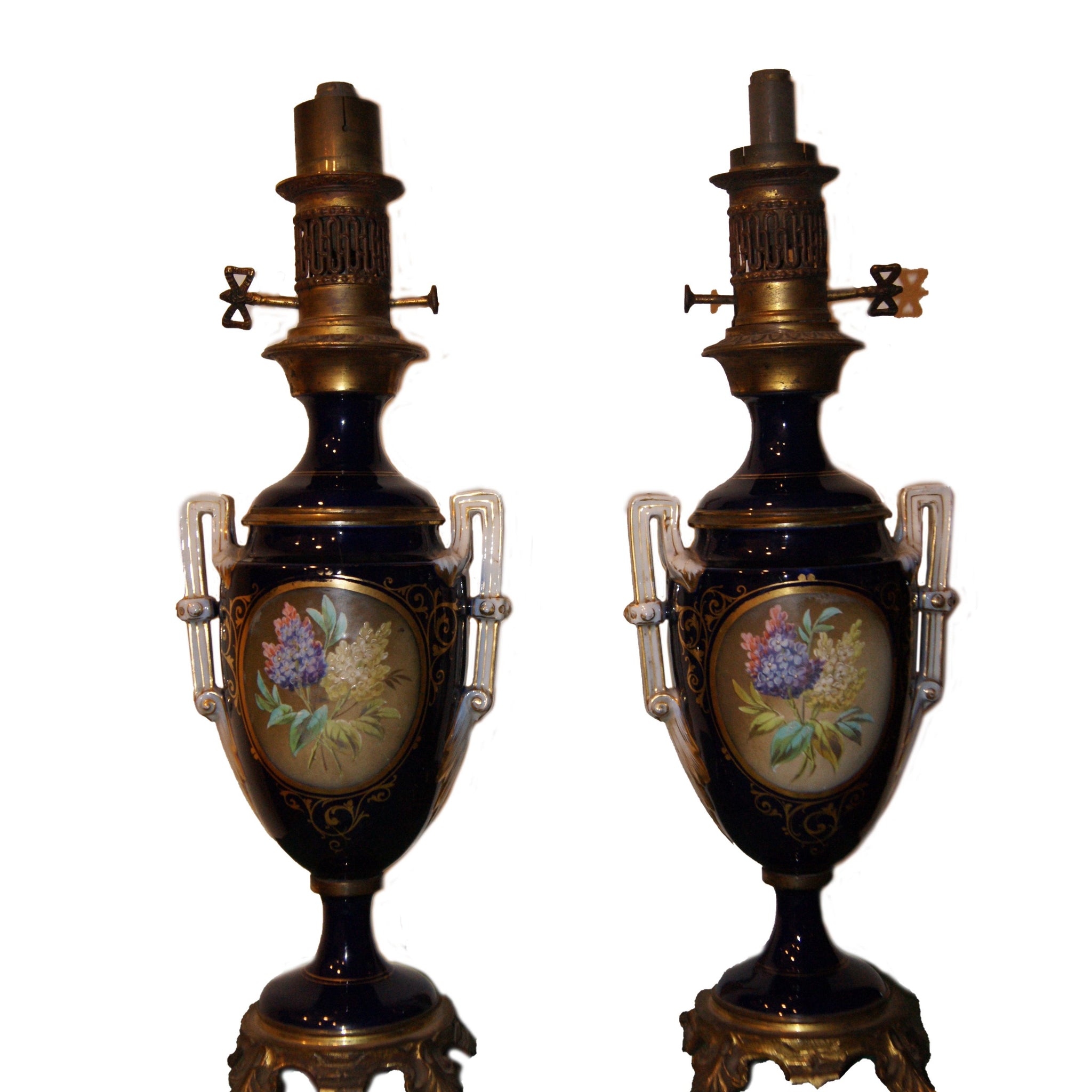 Coppia di lampade ad olio in porcellana
