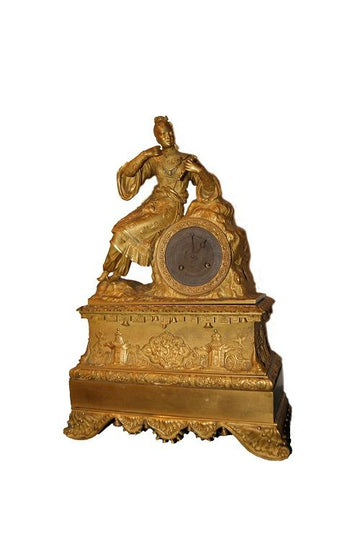 Pendule ancienne de style Empire français du 19ème siècle en bronze doré