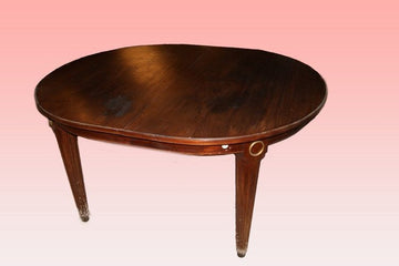 Antique French Louis XVI style extendable table from the 1800s in mahogany