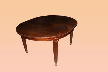 Antique French Louis XVI style extendable table from the 1800s in mahogany