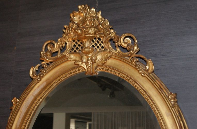 Specchiera ovale verticale con cimasa foglia oro del 1800 francese
