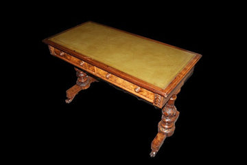 Antique writing writing table from the early 19th century in walnut with leather top