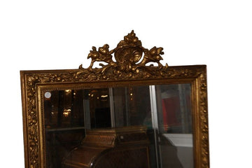Grand miroir Louis XVI à cymatium doré