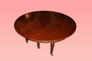 Antique English extendable table from the 1800s Regency style in mahogany