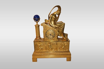 Antique Empire mantel clock from 1800 with French gilt bronze lady