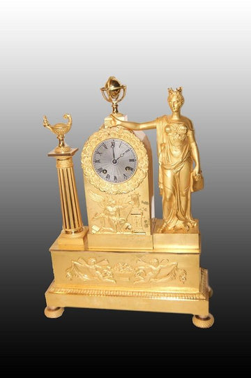 Antique 19th century French mantel clock in gilded mercury bronze