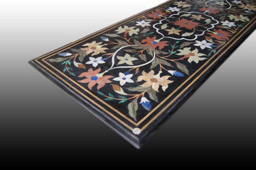 Antique black marble table with semi-precious stone flowers inlays