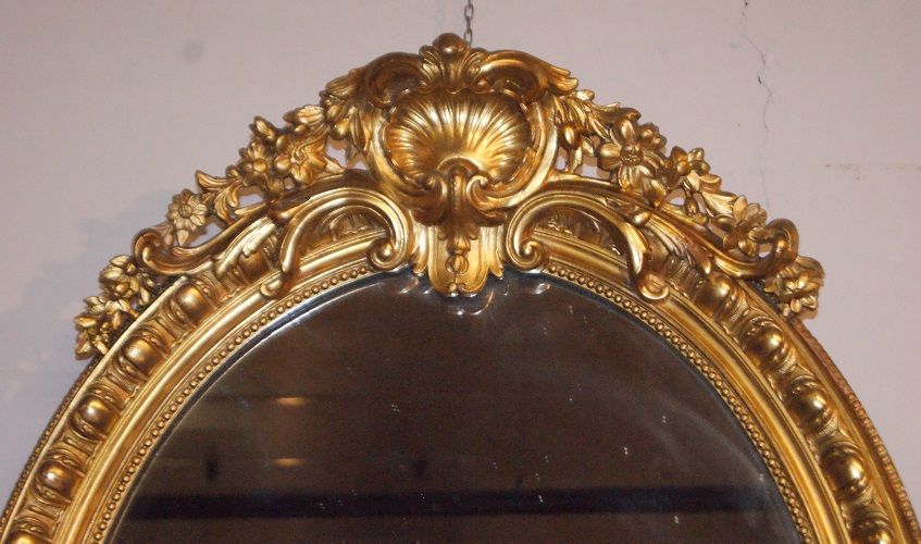 Antica specchiera francese del 1800 dorata ovale verticale Luigi XV