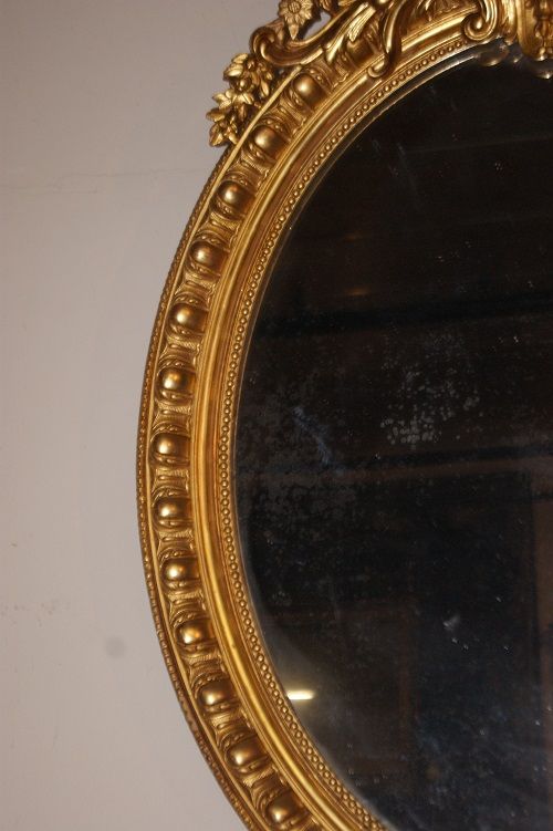 Antica specchiera francese del 1800 dorata ovale verticale Luigi XV