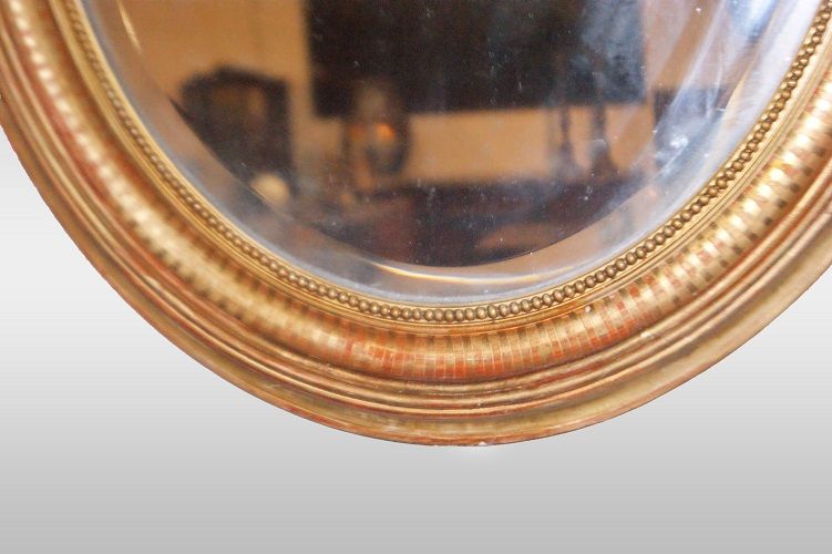 Antica specchiera ovale francese del 1800 stile Luigi XV dorata 