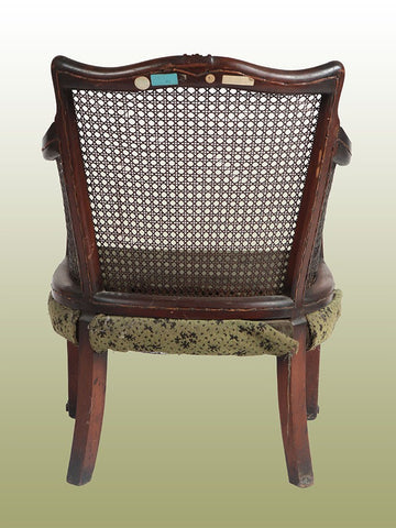 Armchair with straw backrest