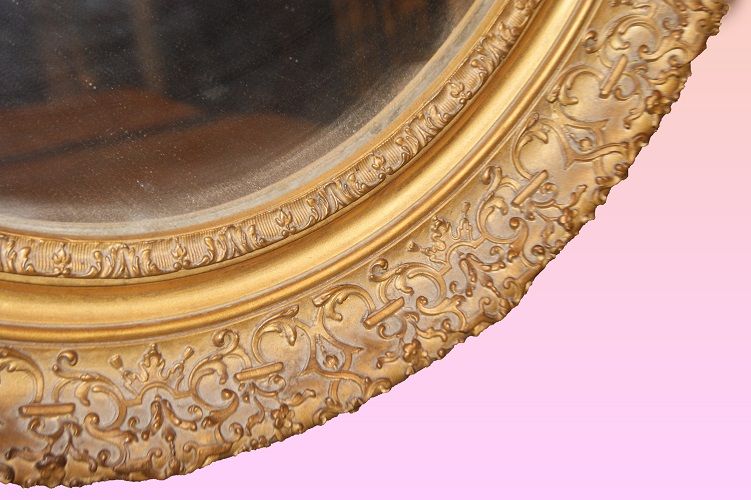 Antica specchiera ovale dorata foglia oro con cimasa stile Luigi XV