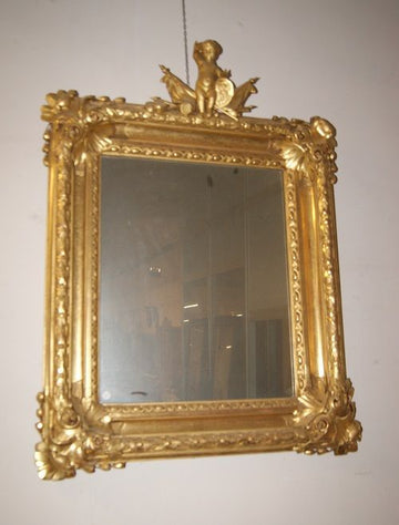 Superbe miroir doré français avec chérubin