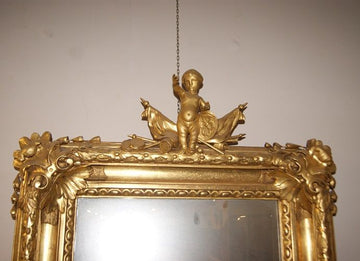 Stunning French gilded mirror with cherub