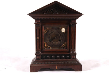 Antique English oak mantel clock with carvings