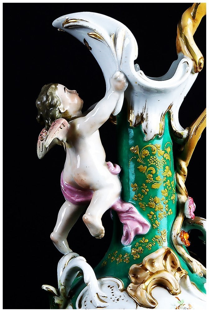 Coppia di antiche brocche in porcellana di Sevres con decori floreali