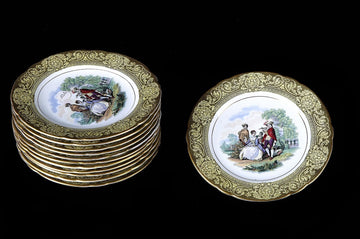 Service à dessert ancien composé de 12 assiettes en porcelaine décorées