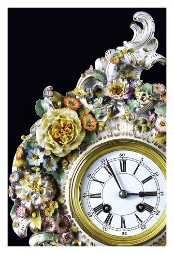 Extraordinary porcelain mantel clock richly decorated with polychrome floral motifs