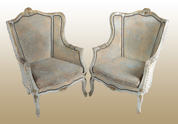 Pair of antique French bergere armchairs from the 1800s, lacquered and carved