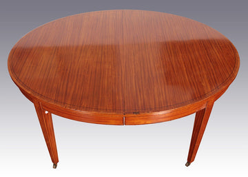 Table ovale antique extensible en bois satiné avec incrustations