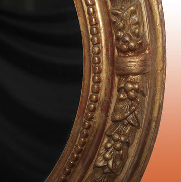 Miroir ovale français antique des années 1800 avec ornements de tablettes