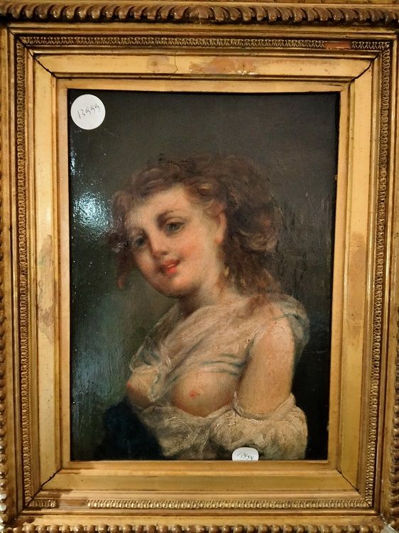 Antico olio su tavola di donna con volto provocatorio e seni scoperti