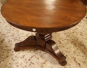 Antique French circular table from the 1800s in Directoire style in mahogany