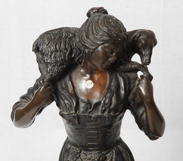 Antique French metal statue from the 1800s depicting a shepherdess
