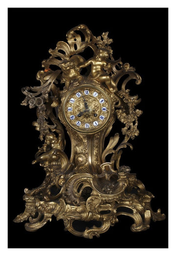 Antique French gilded bronze mantel clock from the mid 1800s Baroque style