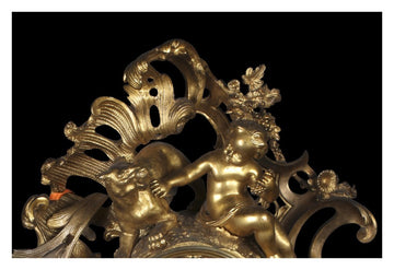 Pendule française antique en bronze doré du milieu des années 1800, style baroque