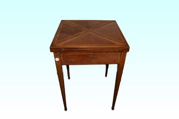 Antique Victorian card table from the 1800s in mahogany and inlays