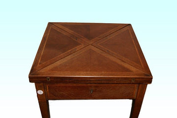 Antique Victorian card table from the 1800s in mahogany and inlays