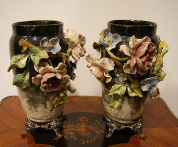 Pair of French vases decorated in relief